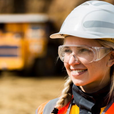 Female mining student wearing a helmet