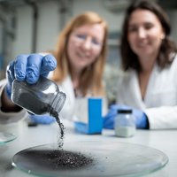 Student and professor in the laboratory.