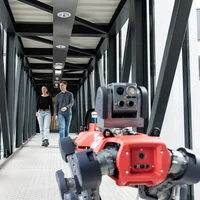Robot dog and students.