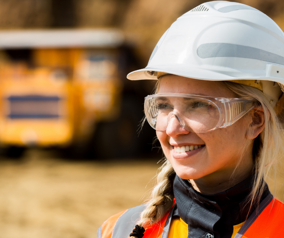 Female mining student wearing a helmet